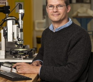 Man using a microscope