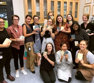 Anne Hillam guest lecturer group holding books