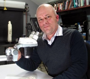 Man using a microscope