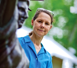 Woman holding a paintbrush