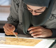 Student working in paper conservation lab